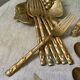 Service de couverts en bronze nikelé, façon bambou