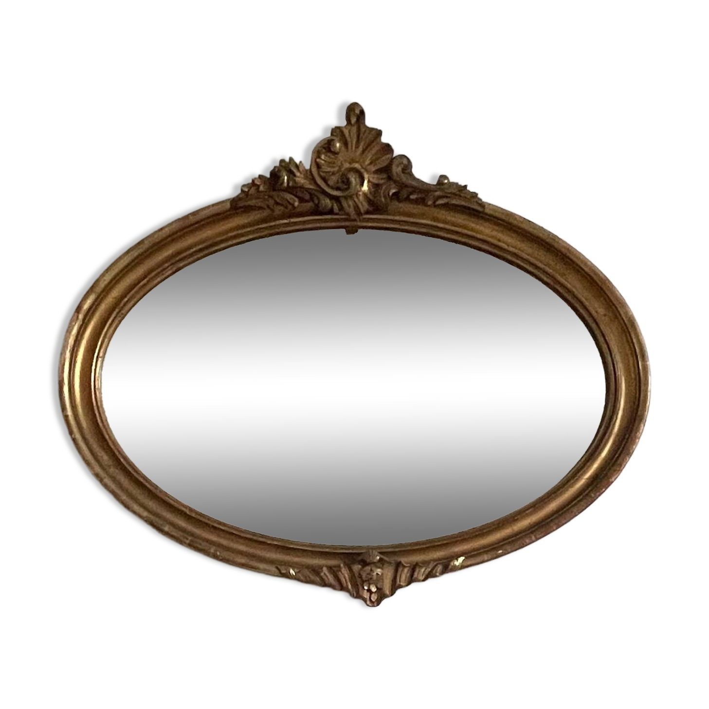 Antique oval gilt mirror.