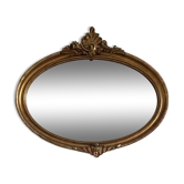 Antique oval gilt mirror.