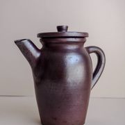 Brown ceramic artisan coffee maker
