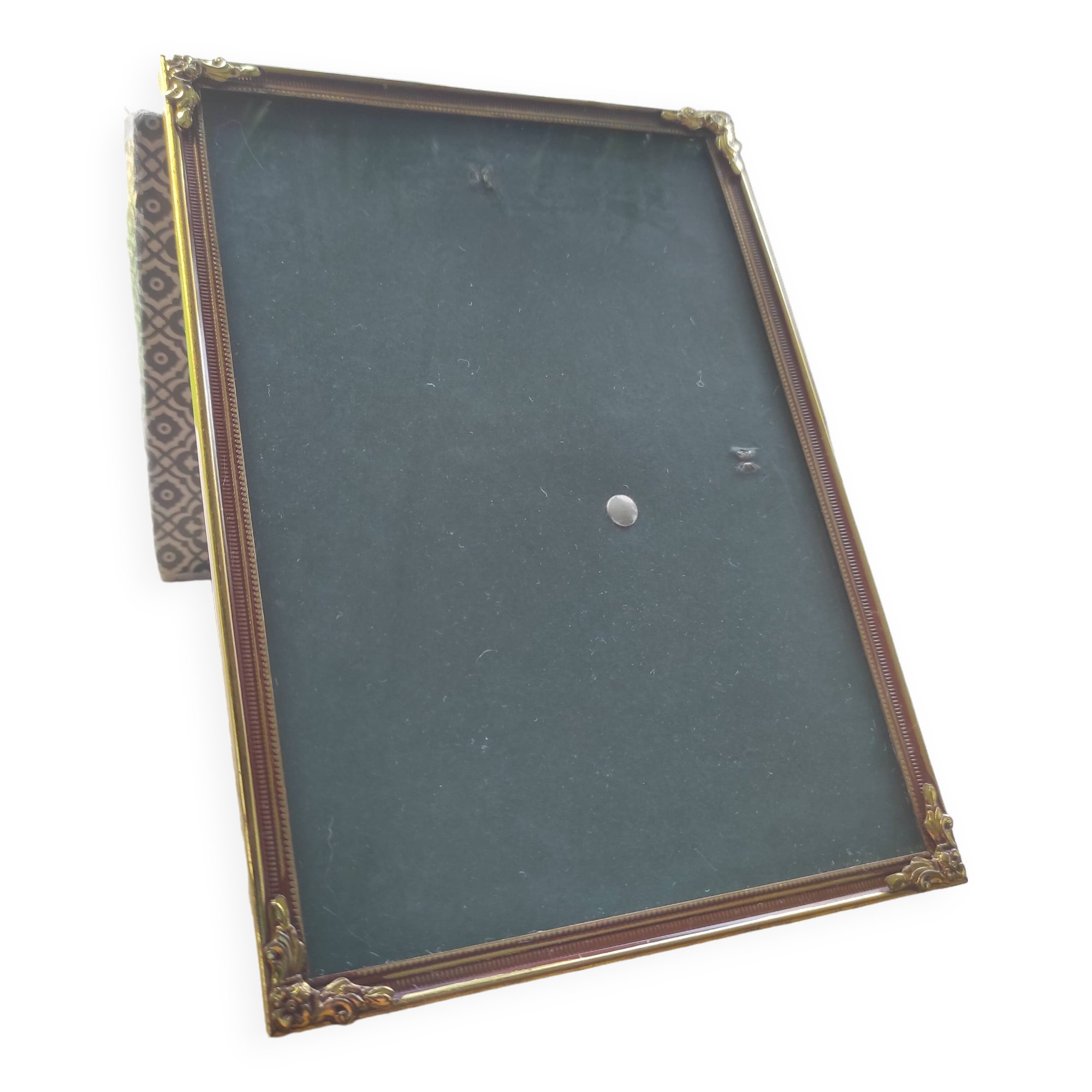 Vintage photo frame in gold and decorated metal