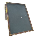 Vintage photo frame in gold and decorated metal