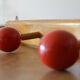 Vintage wooden hook with 4 racks painted red and black