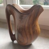 Olive wood pitcher.