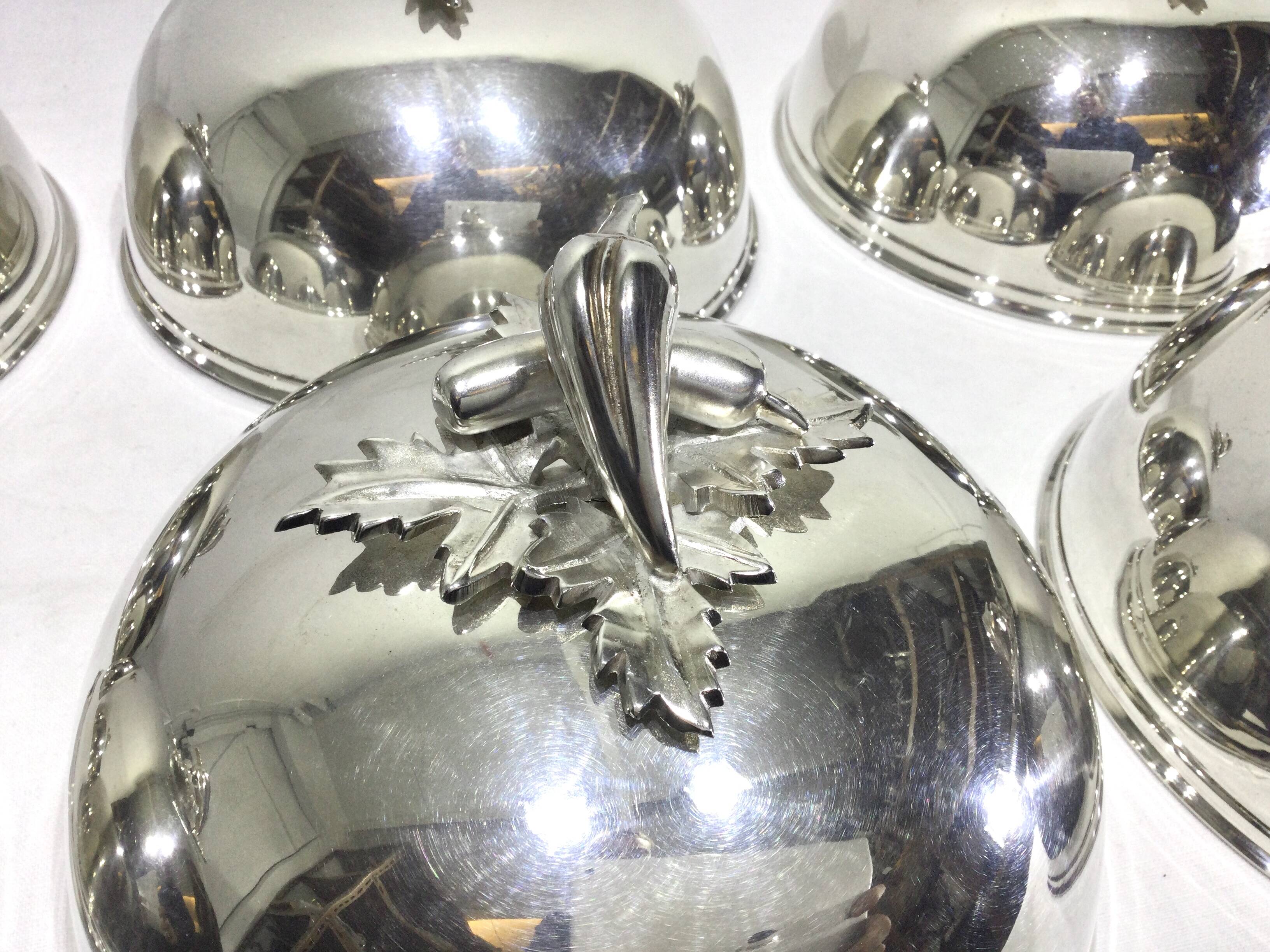 Set of silver-plated serving dishes and bells