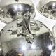 Set of silver-plated serving dishes and bells