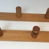 Charlotte Perriand, pair of fir wall coat racks, French work, around 1970