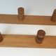 Charlotte Perriand, pair of fir wall coat racks, French work, around 1970
