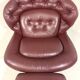 French burgundy leather space age lounge chair & footstool 1970’s