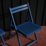 Set of two blue folding chairs