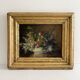 Old oil painting on wood of a bouquet of flowers signed Petit.