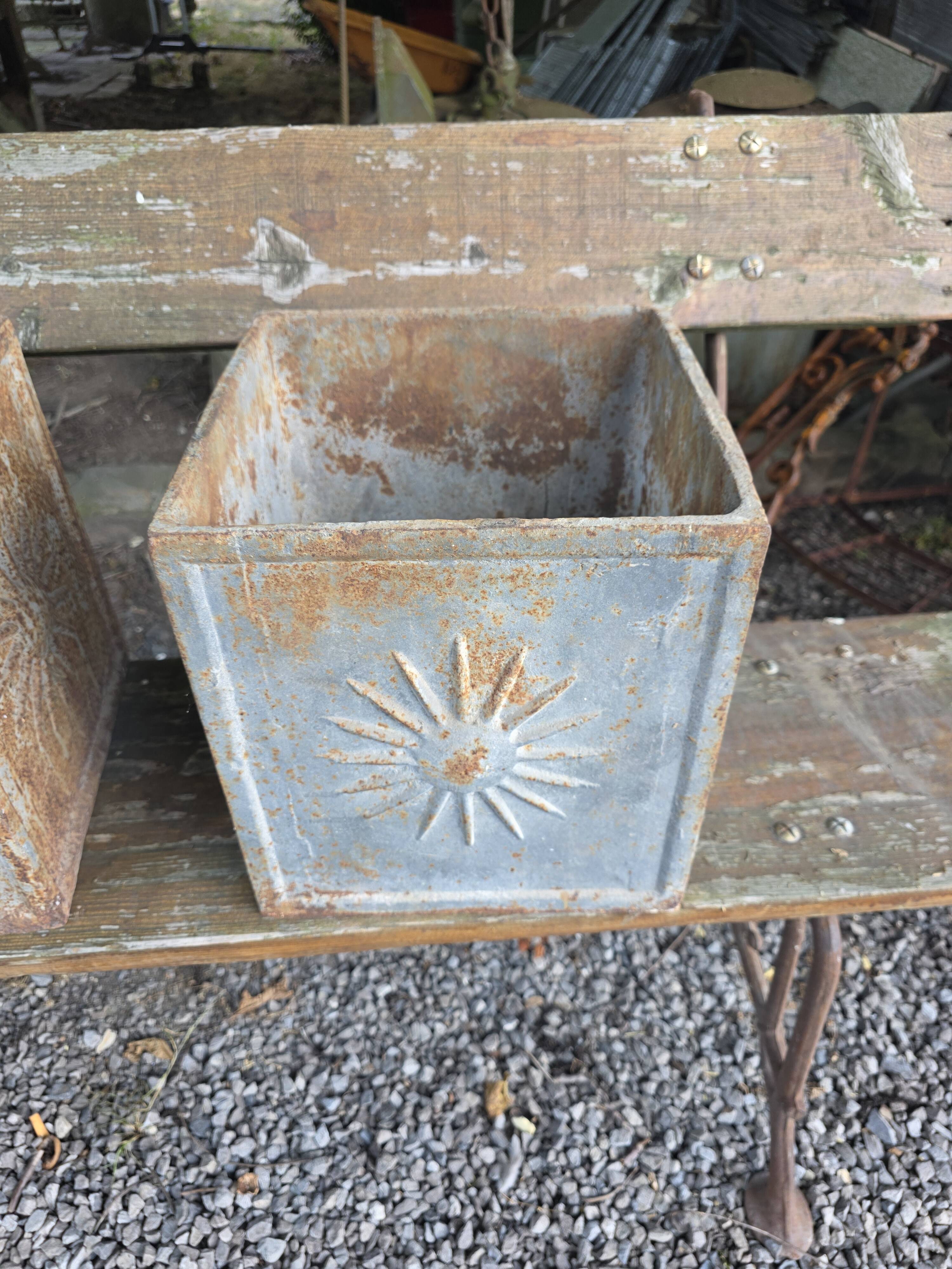 Pair of cast iron planters