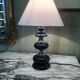 Black wooden lamp chrome braces