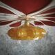 Rattan and terracotta linen pendant light and vintage amber globe