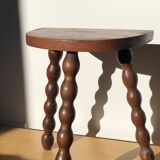 Turned wooden tripod stool