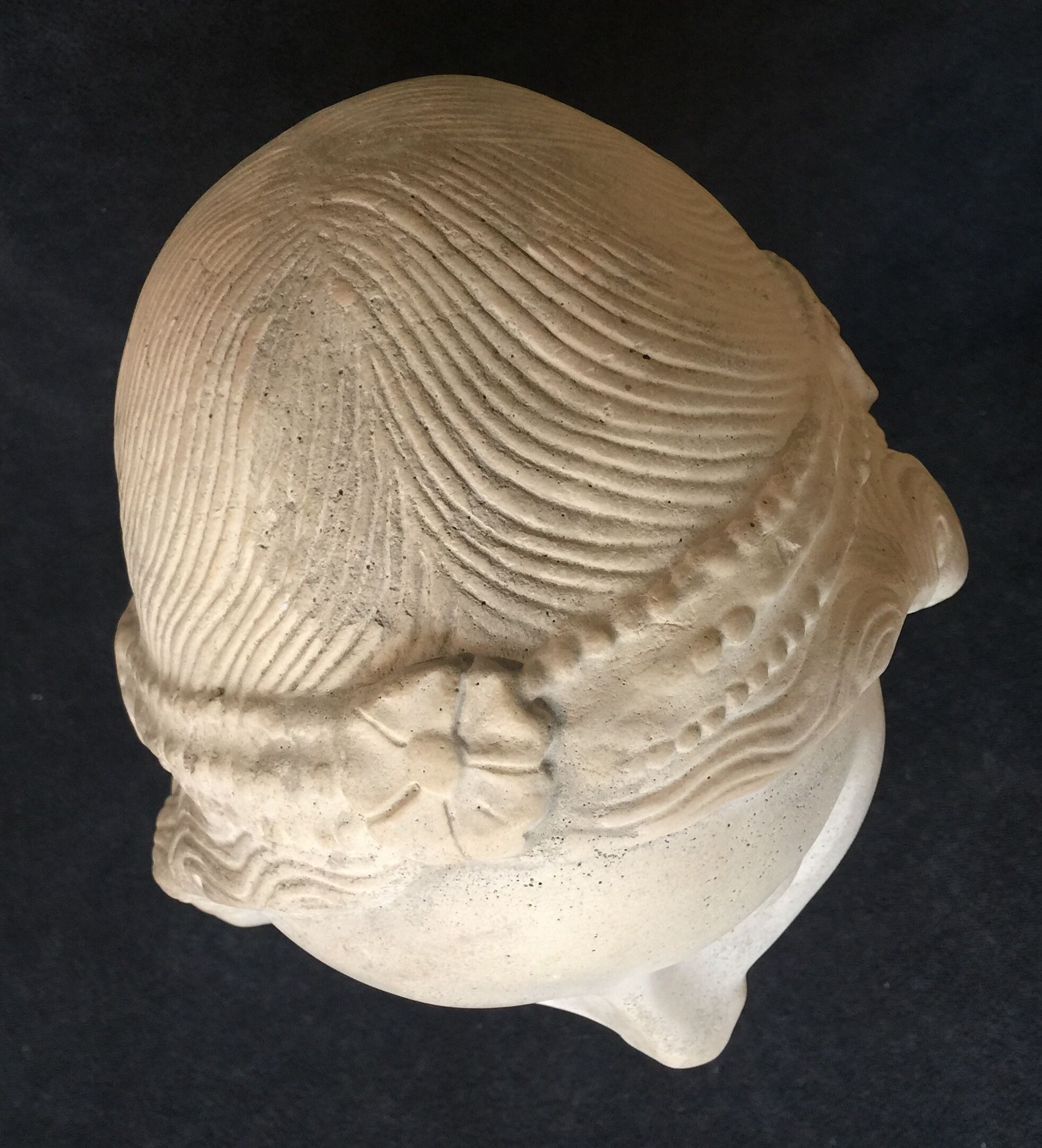 Bronze-middle-aged woman's head in plaster