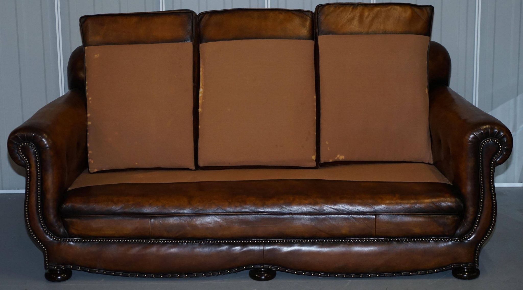 Restored vintage leather sofa from a gentleman's Victorian club.