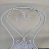 Pair of wrought iron garden chairs, antique manufacture