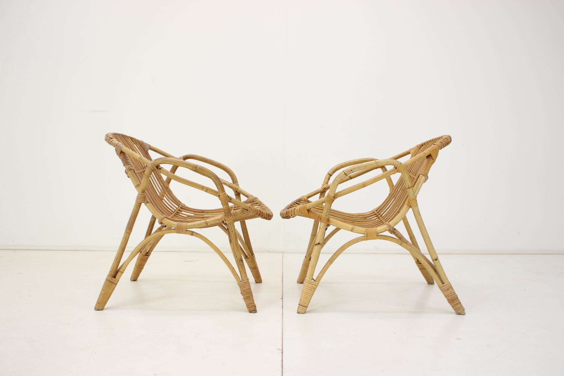 Pair of Alan Fuchs Rattan Lounge Ch, 60s