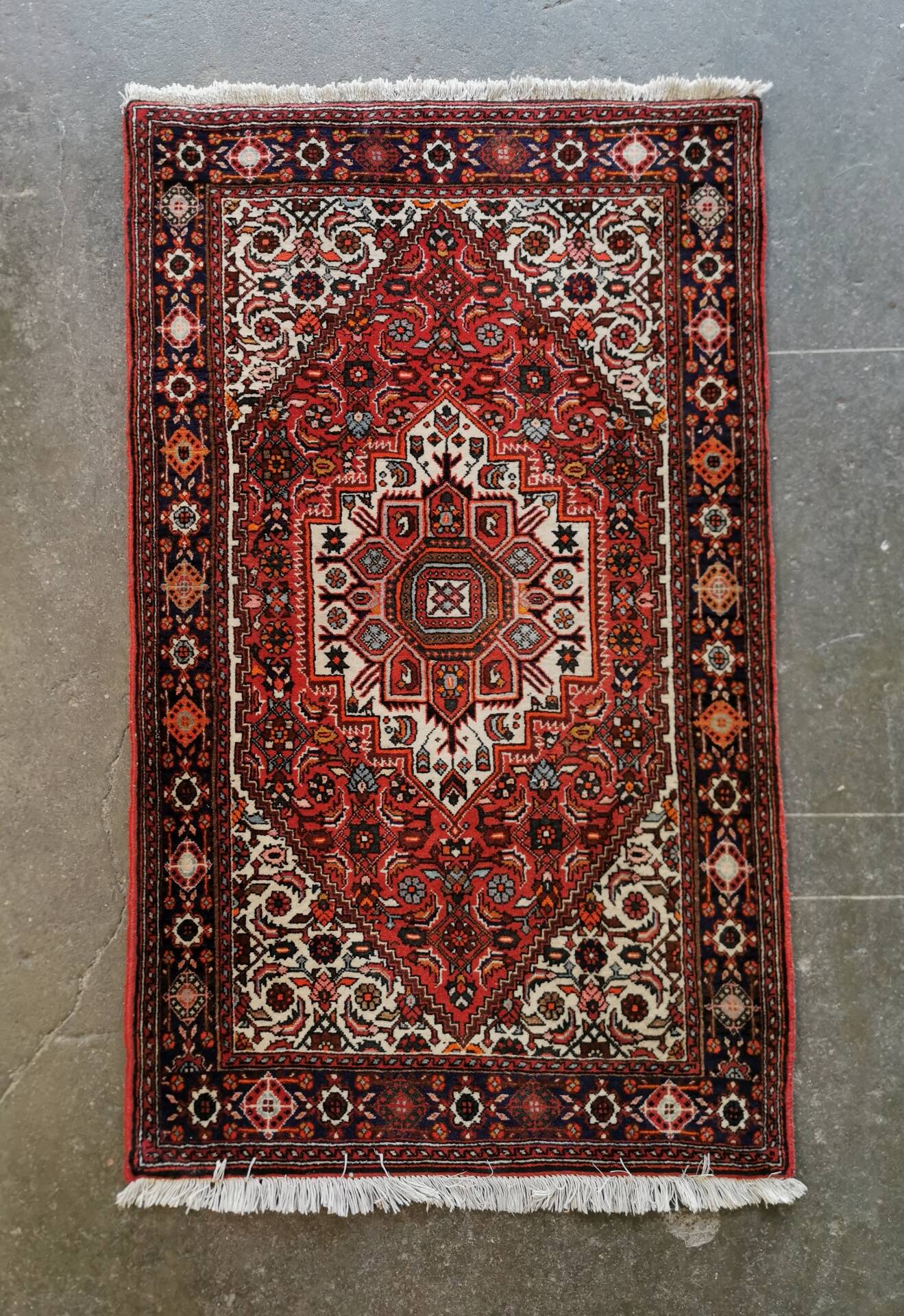 Hand-knotted Persian carpet from Iran, 128 x 76 cm.