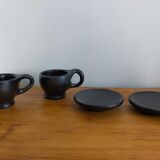 Terracotta service painted in black saucer cups and top