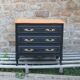 Louis XV style black commode with natural wood top – 3 drawers