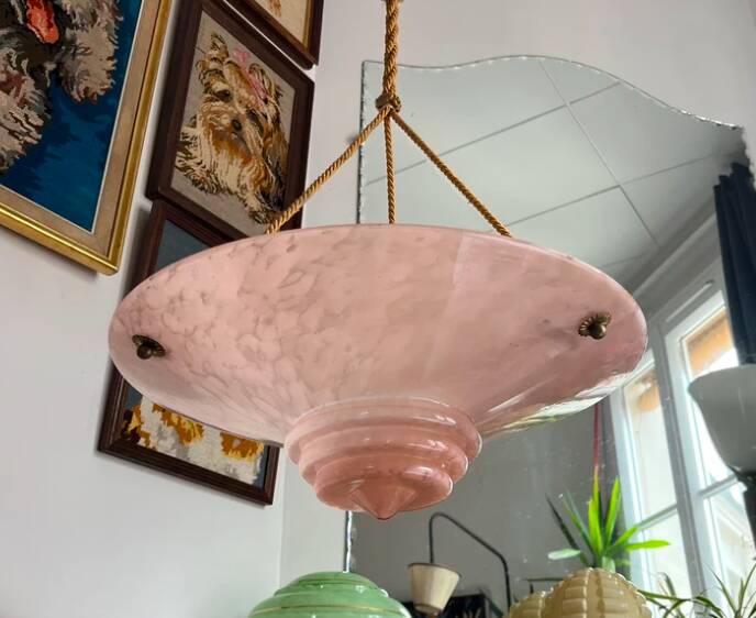 Art Deco basin suspension with pink glass and fabric cords.