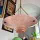 Art Deco basin suspension with pink glass and fabric cords.