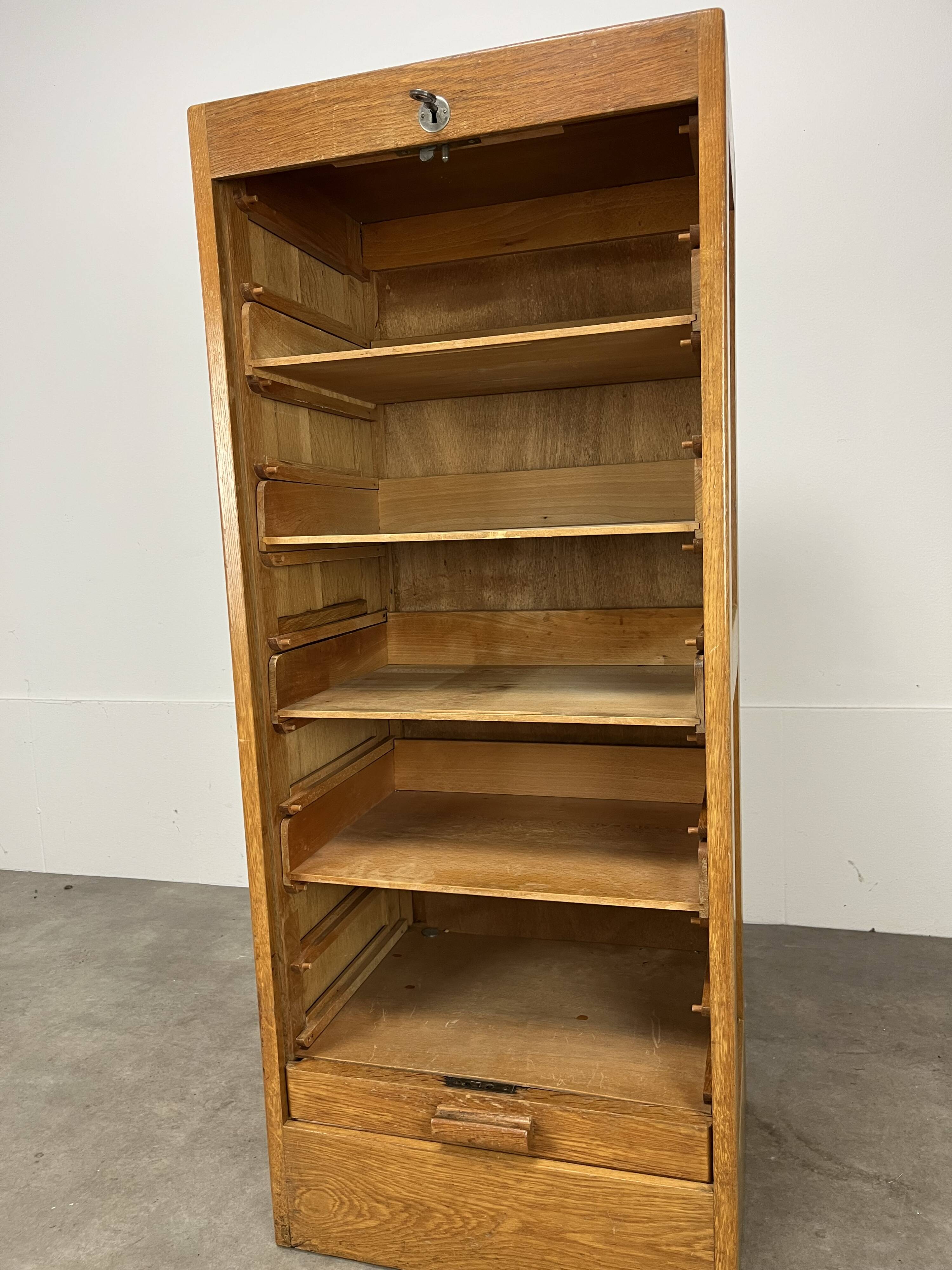 Filing cabinet with curtain, by trade