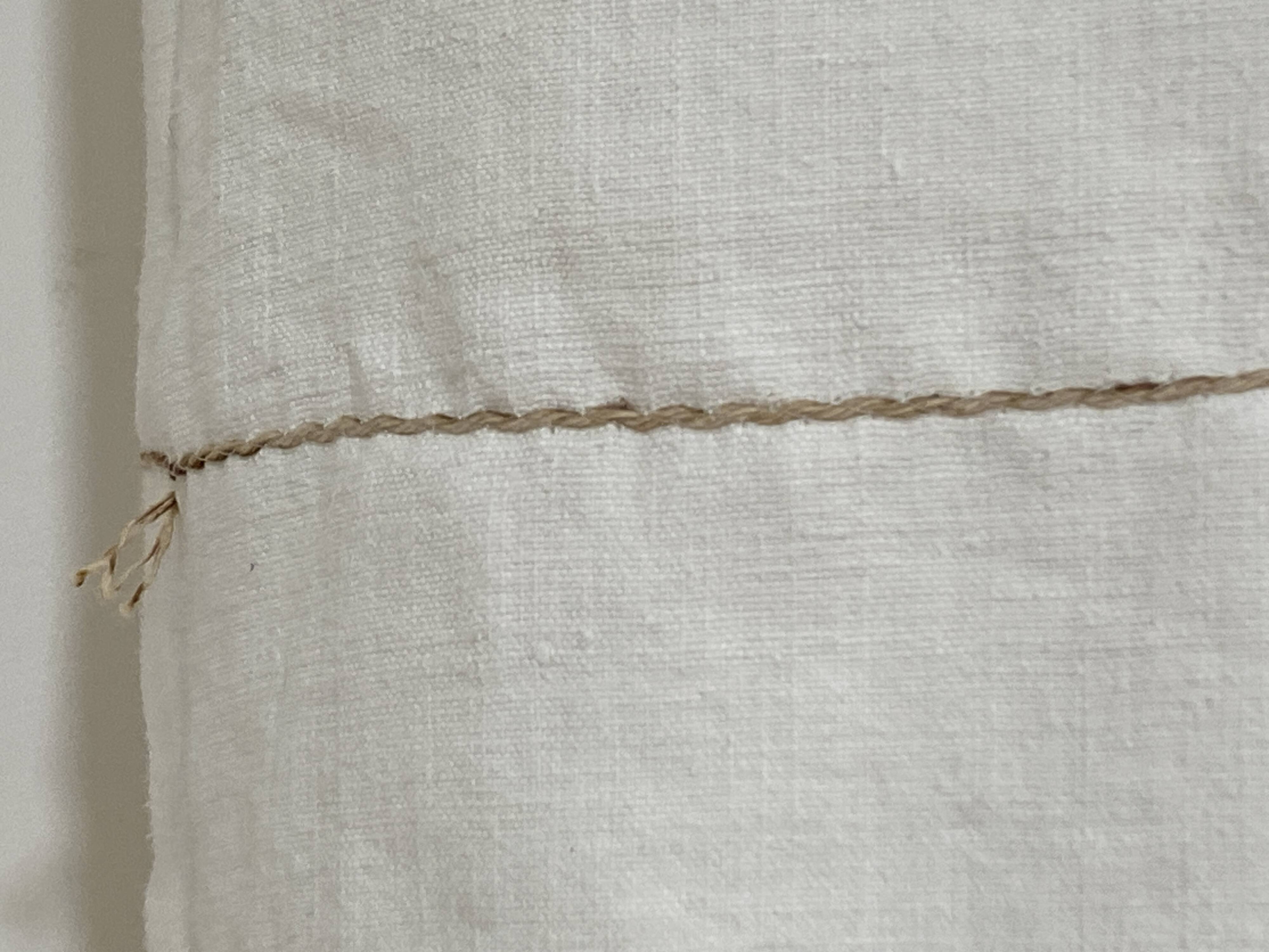 Old linen curtain suspension