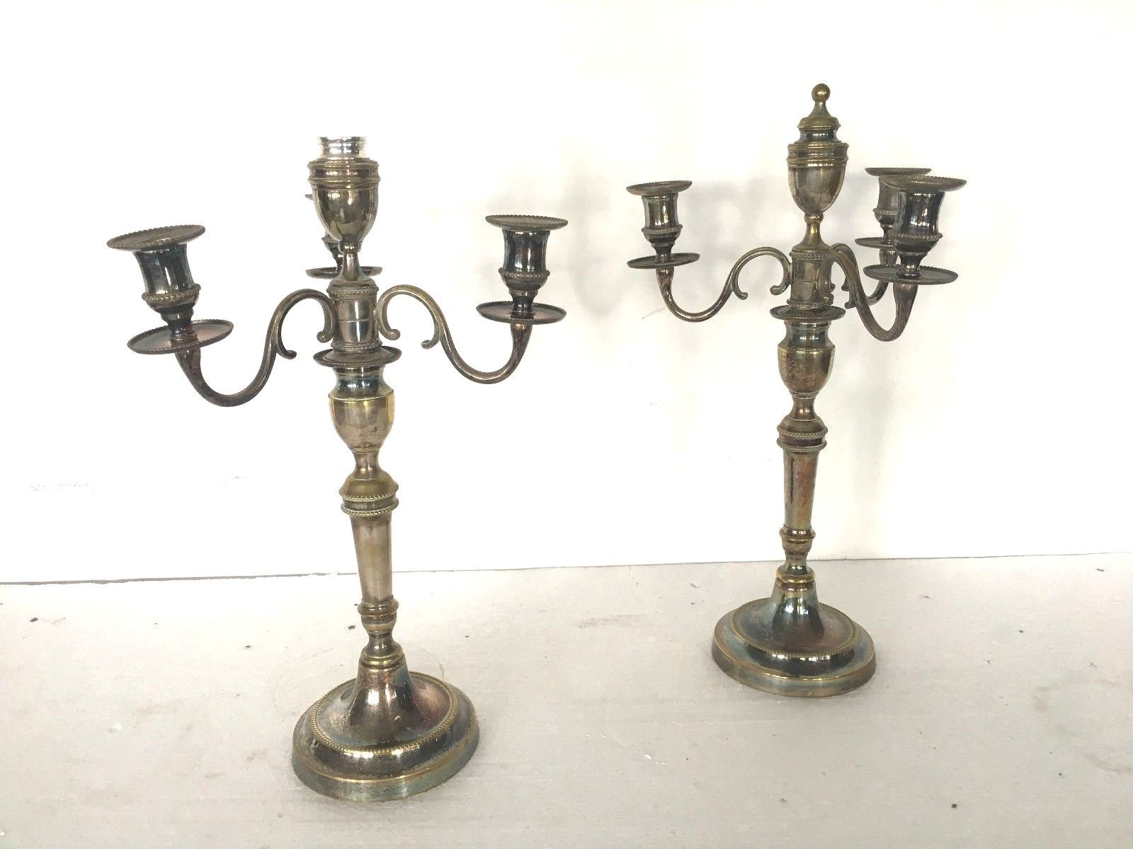 Pair of Louis XVI style in silver bronze candelabra