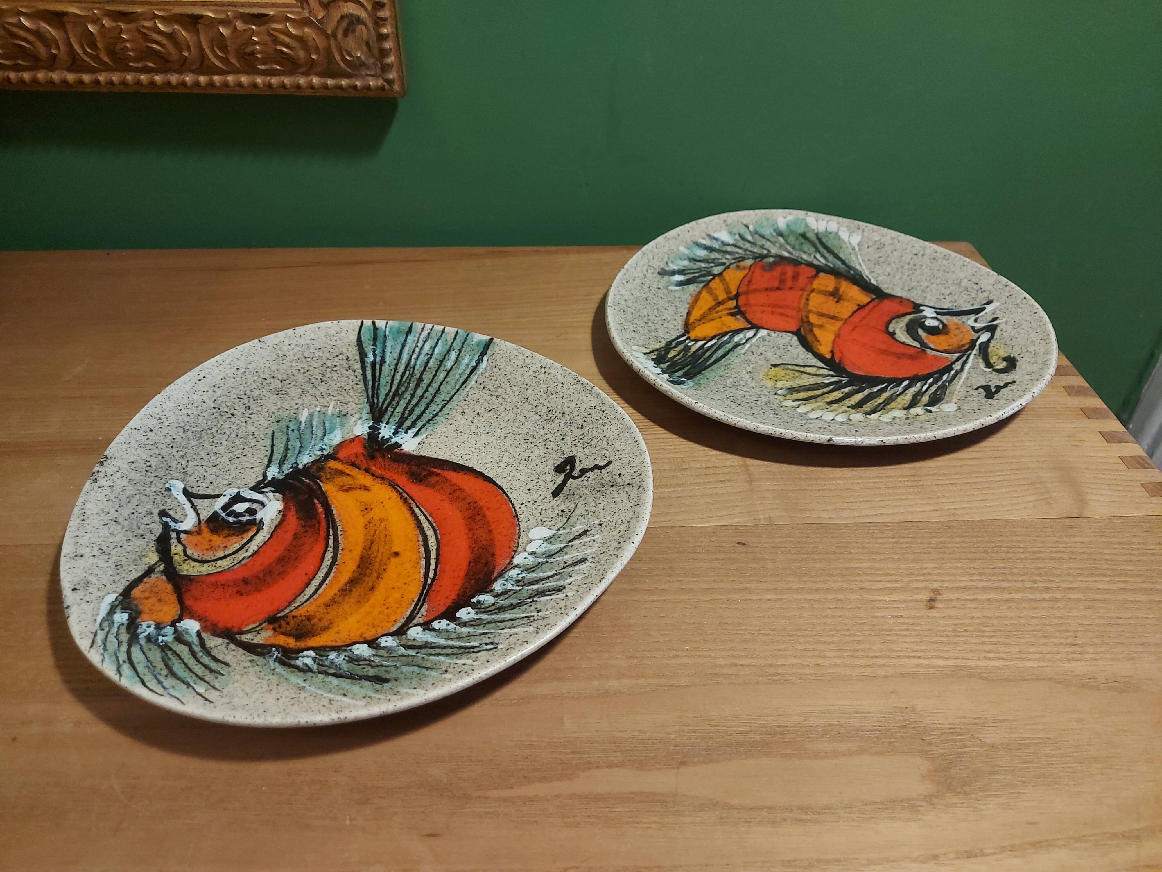 2 vintage ceramic plates with fish decoration