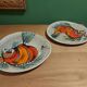 2 vintage ceramic plates with fish decoration