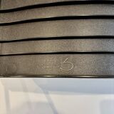 4 Spilimbergo chairs from Italy in chrome steel and black plastic.