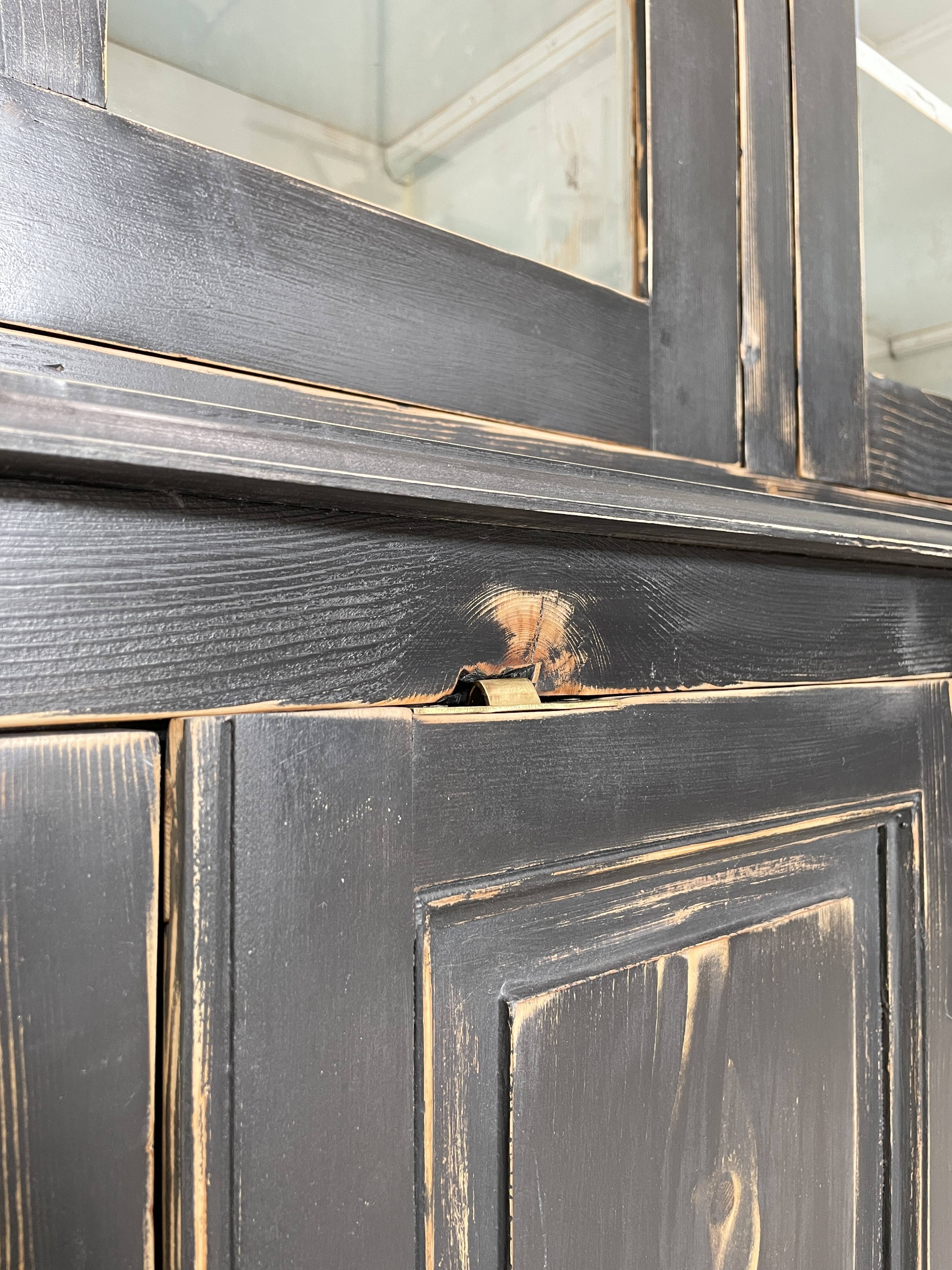 Display cabinet in patinated wood