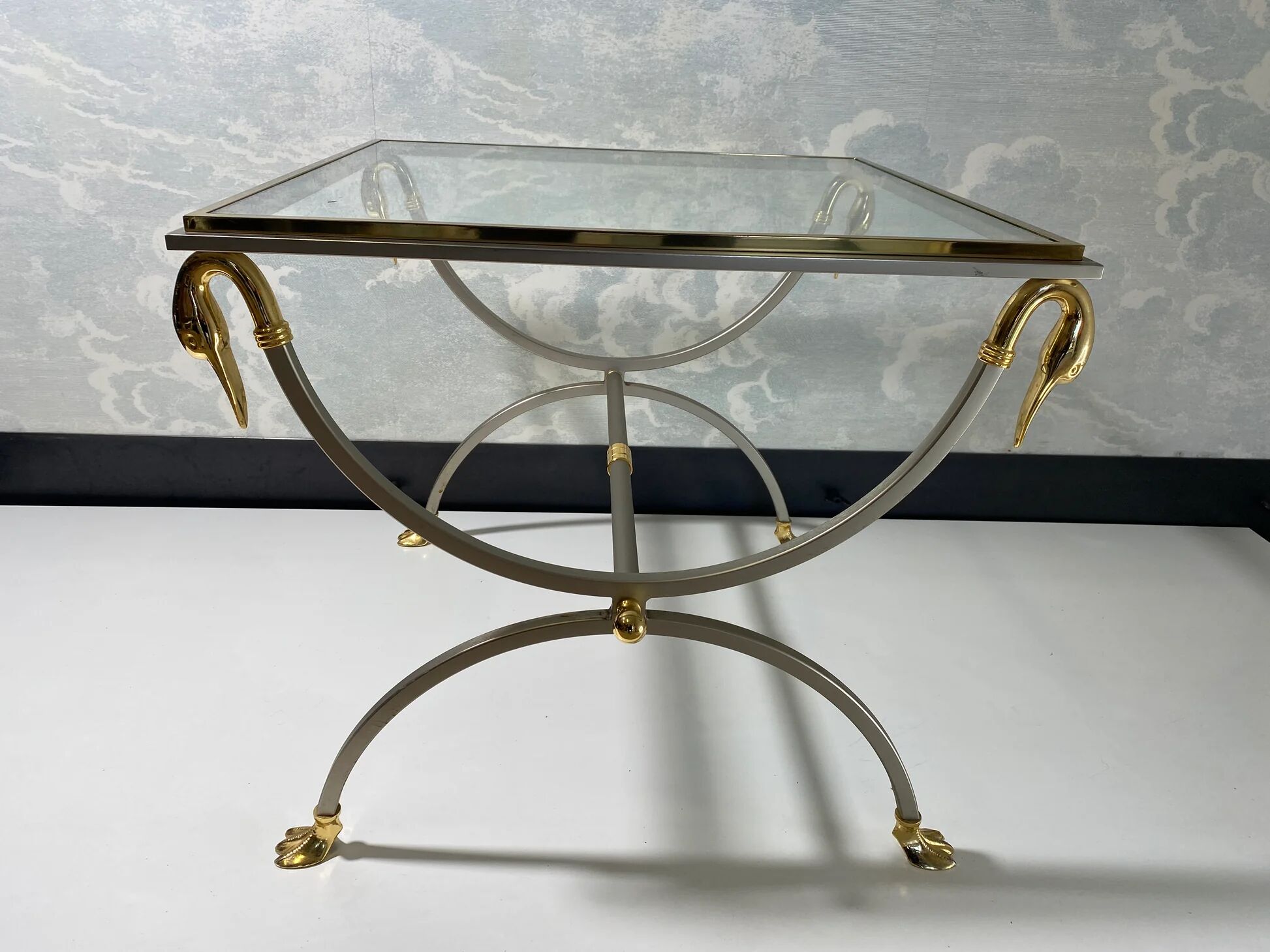 Neoclassical curule side tables by Maison Jansen, France, 1970s.