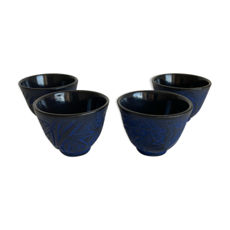4 cast iron tea cups