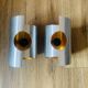 Pair of Space Age wall lights in brushed metal with a copper-orange interior.