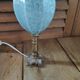 Bedside lamp patinated golden brass tulip glass Clichy bluish