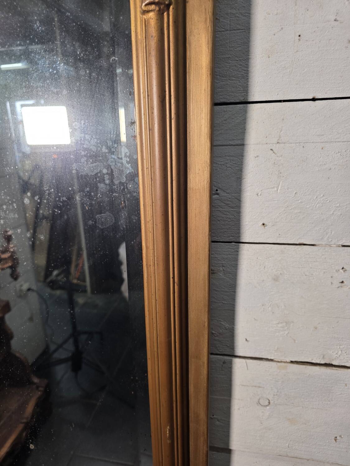 Art Deco gilded trumeau, bevelled mirror