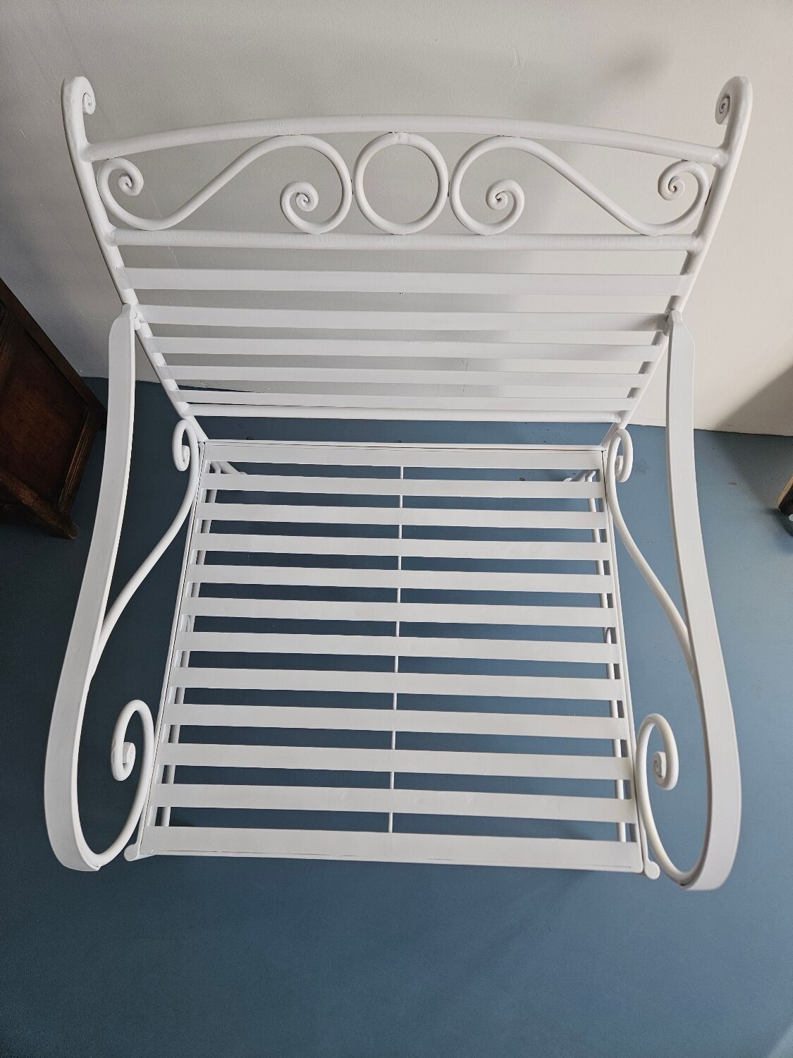 Robust wrought iron armchair