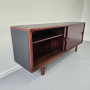 Vintage enfilade in teak and leather, 1970s.