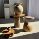 Side table in solid teak with a circular top, column base H51.5 D50.