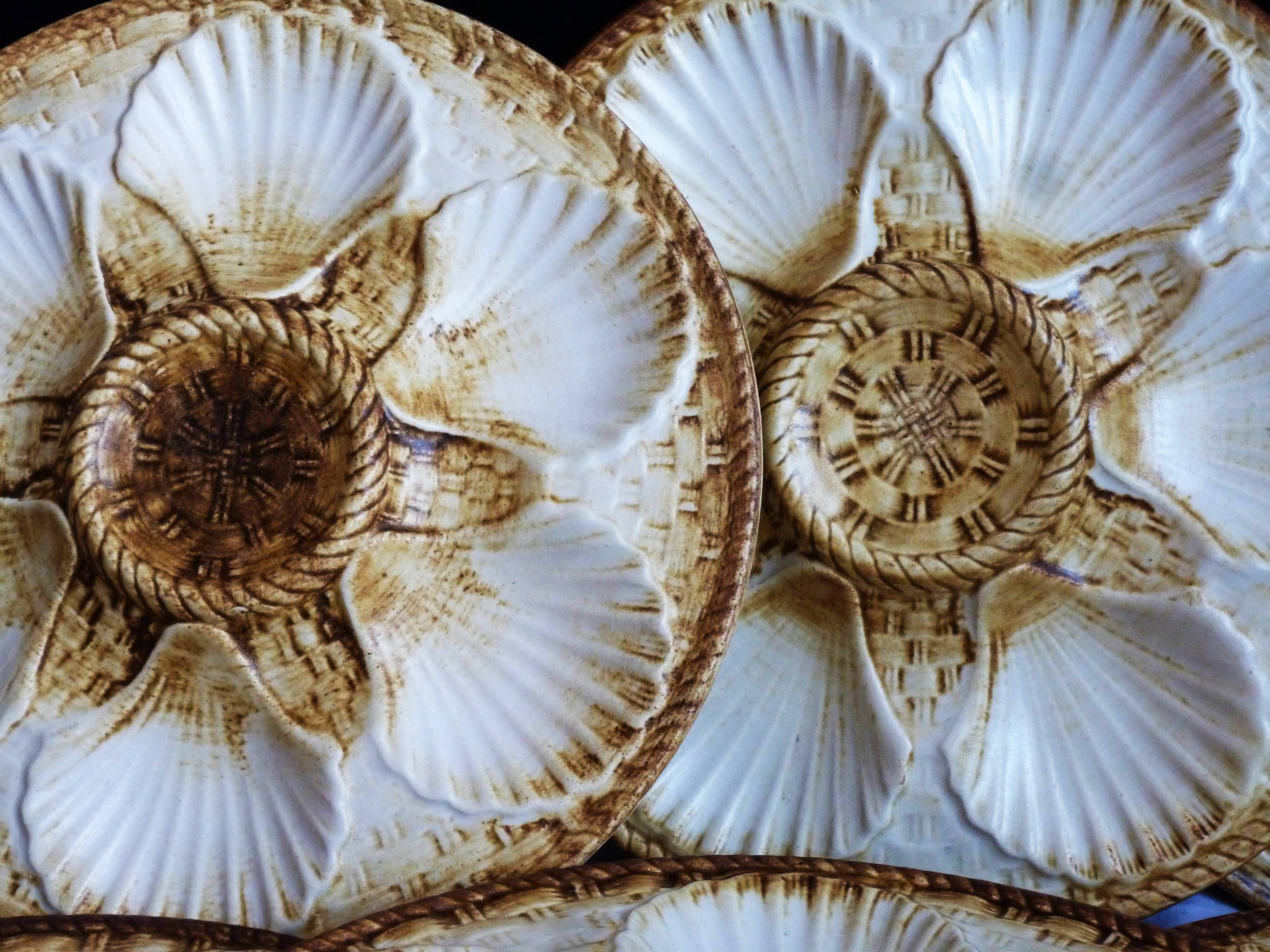 Oyster service, platter and 6 Longchamp oyster plates.