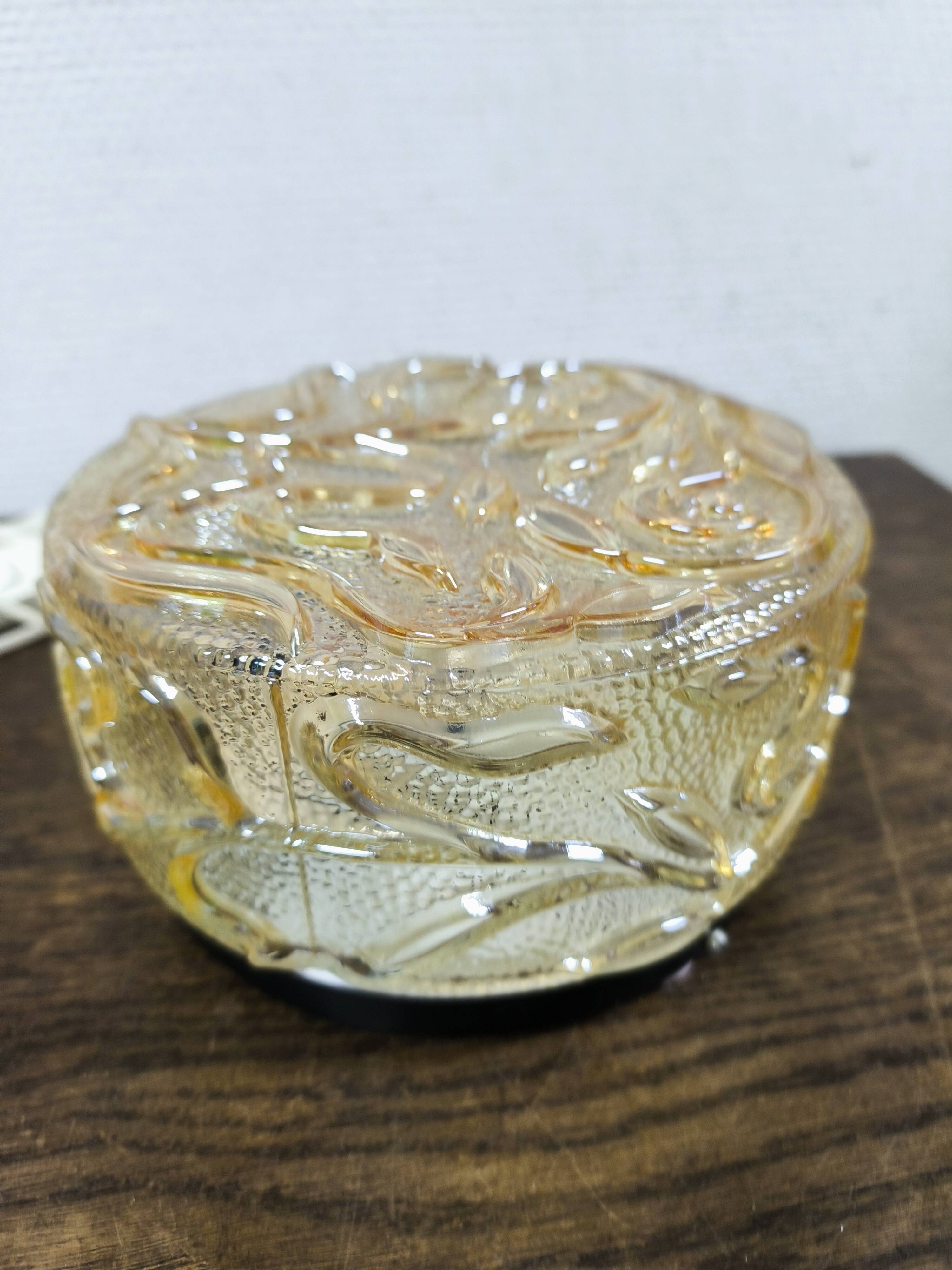 Amber round glass wall lamp with vintage flowers