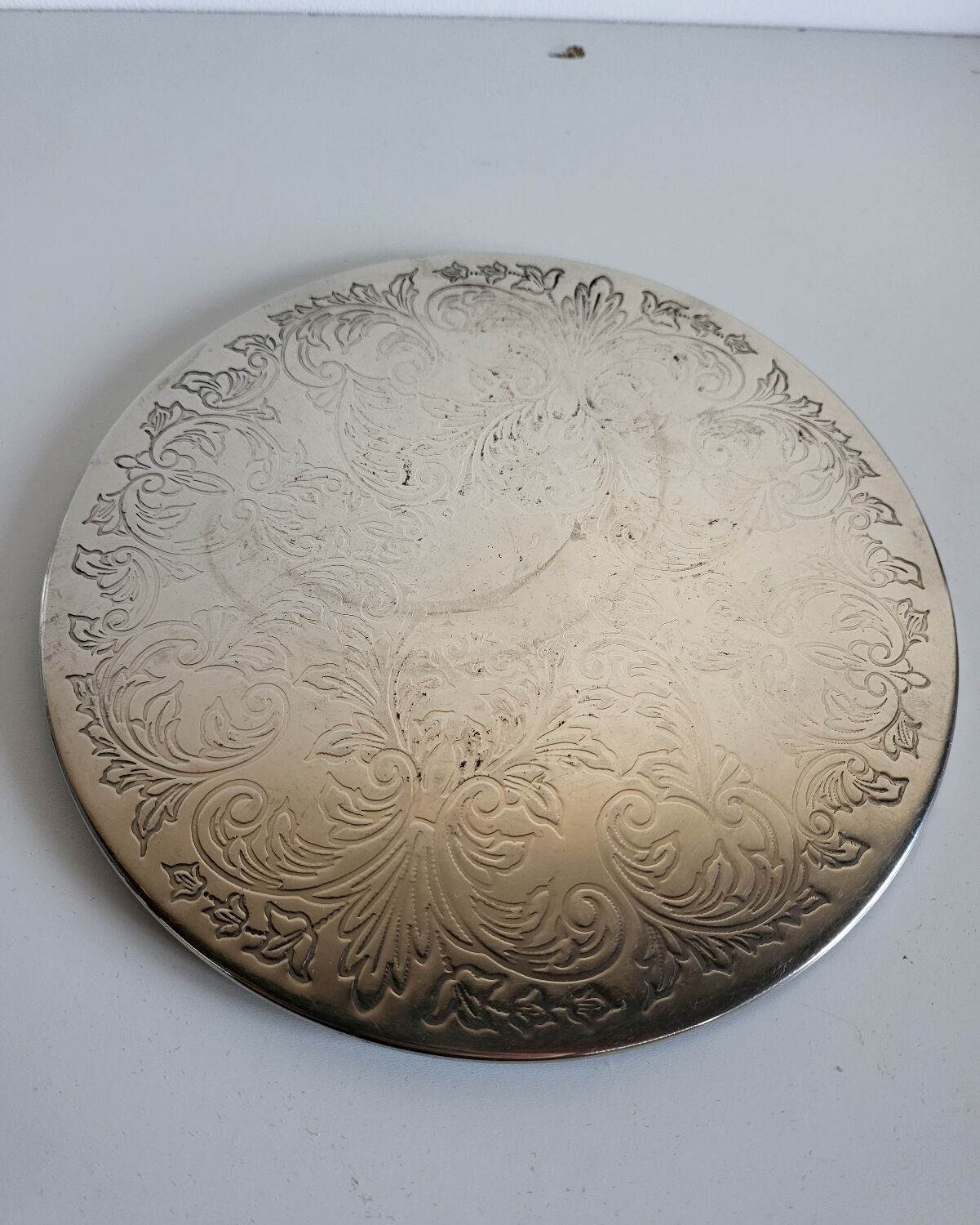 Silver-plated metal trivet English