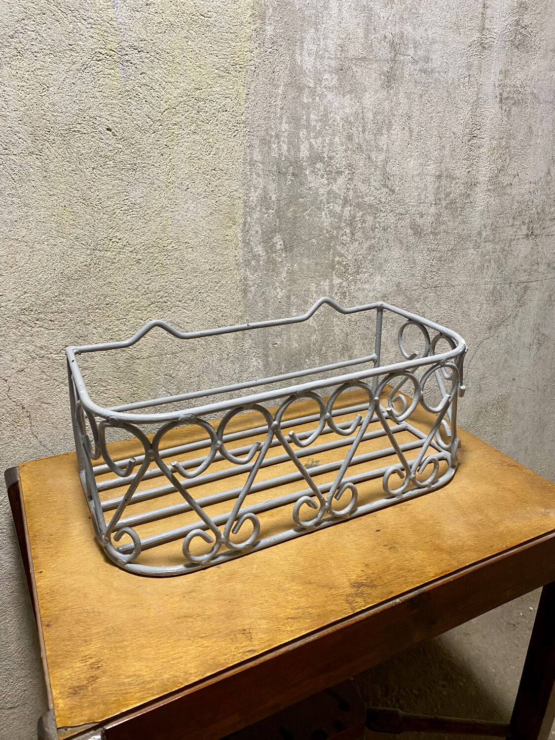 Gray wrought iron shelf