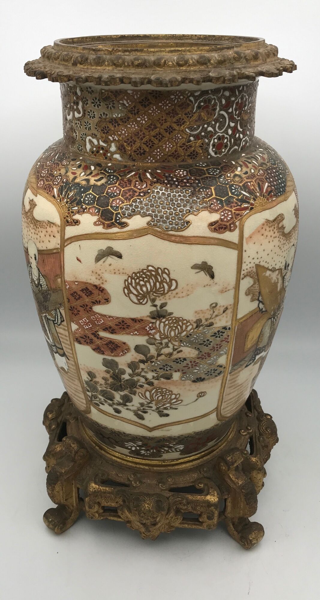 Old satsuma ceramic vase with various decorations mounted on bronze