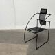 Postmodern black Quinta chair in perforated metal by Mario Botta for Alias, 1980s.