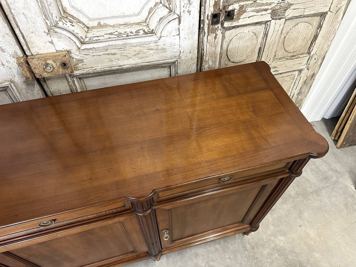 Louis XVI style enfilade in cherry wood, 20th century.